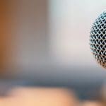 Microphone in meeting room for a conference
